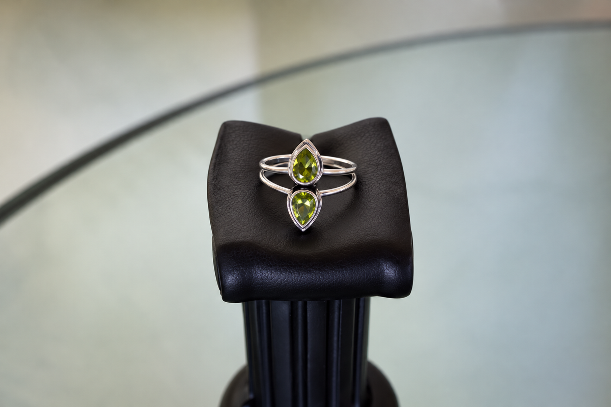 Twin Orbits Peridot Ring
